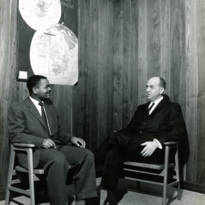 J. Richard Palmer Speaking with Colleague in 1961